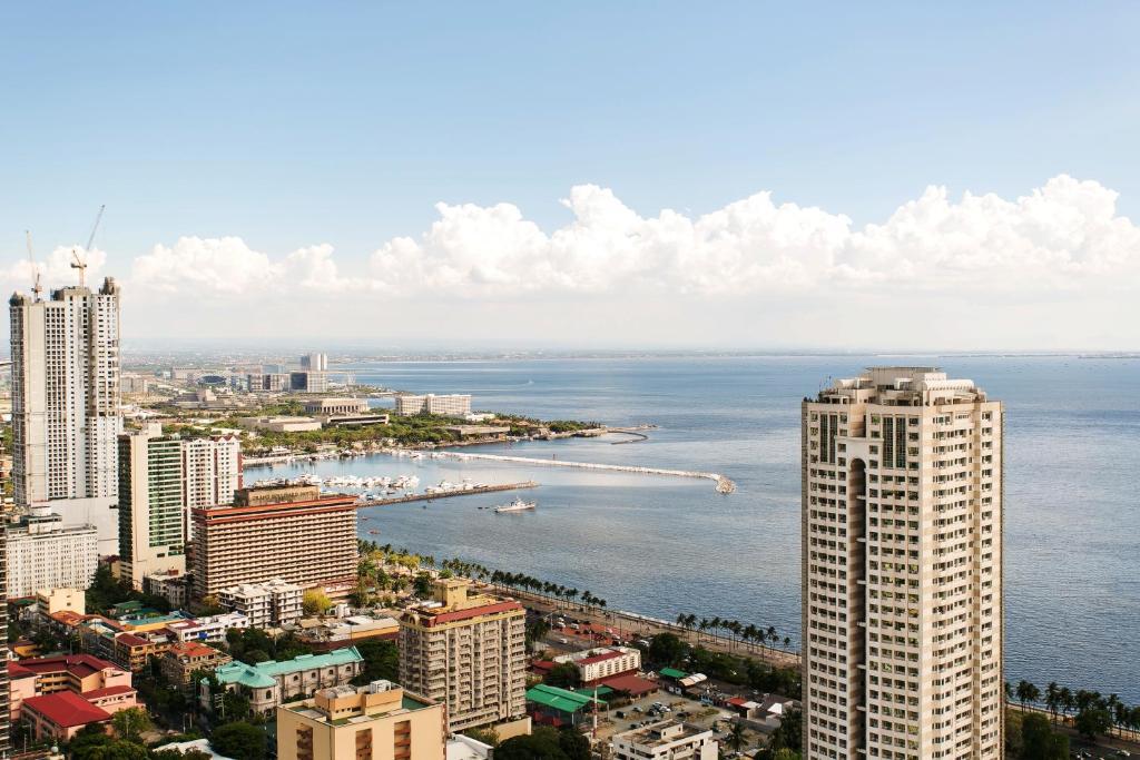 Jmm Apartment Suites Manila Habitación foto